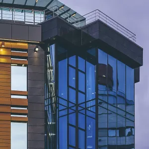 Modern high-rise office building with a glass facade Modern high-rise office building with a glass facade