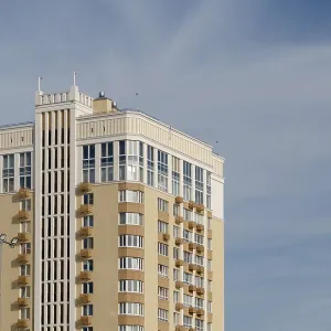 Modern multi-storey building against sky Modern multi-storey building against sky