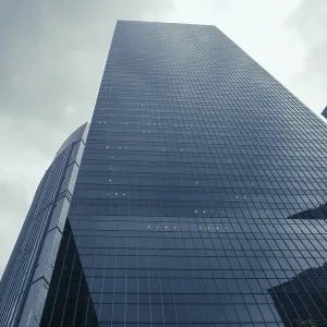 Modern skyscrapers and dramatic rainy sky over them