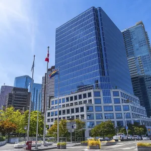Modern skyscrapers rising against a blue sky