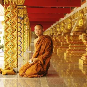 Monk in the Wat Phrathat Suthonamongkhonkhiri Temple Monk in the Wat Phrathat Suthonamongkhonkhiri Temple