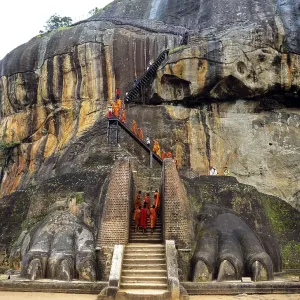 Monks at the Lion Staircase of the Rock of Sigiriya