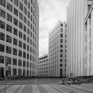 Monochrome image of modern architectural buildings in an empty urban space