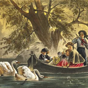 Mother with her two children on a boat trip across a lake
