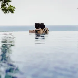 Mother and daughter by the pool, Vietnam