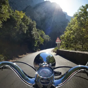 Motor scooter being driven in the Gorges de Galamus
