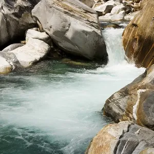 The mountain brook Verzasca near Brione in the Verzasca valley The mountain brook Verzasca near Brione in the Verzasca valley