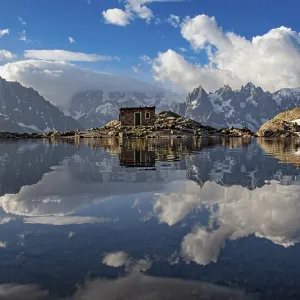Mountain lake with clear reflection
