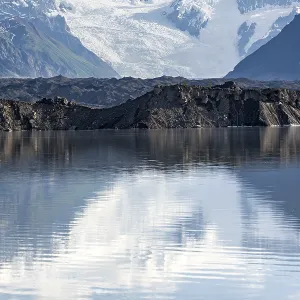 Mountain landscape reflected in glacial lake