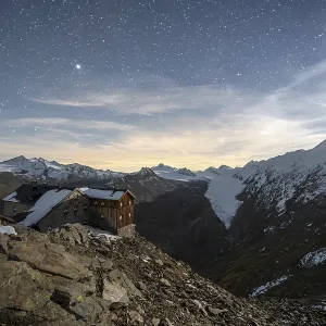 Mountain landscape under a starry sky