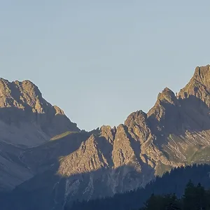Mountain panorama at sunrise from Stillachtal into Warrmatsgundtal Mountain panorama at sunrise from Stillachtal into Warrmatsgundtal