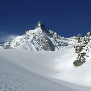 Mountain peak in deeply snowed in high mountains Thorung La Pass Annapurna Region Nepal
