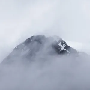 Mountain peak in the fog, Bamsebu
