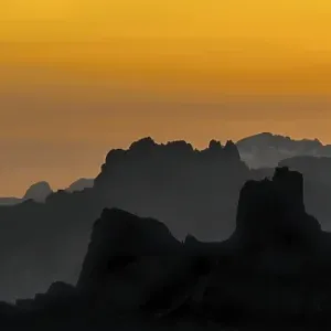 Mountain ranges at sunset in the Sexten Dolomites Mountain ranges at sunset in the Sexten Dolomites