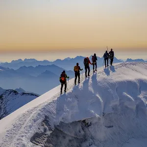 Mountaineer on the summit ridge of the GroBvenediger