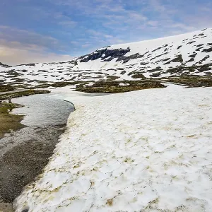 The mountains are covered with last year's snow