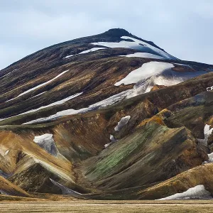 Mountains and hills with blotches of snow in Landmannalaugar