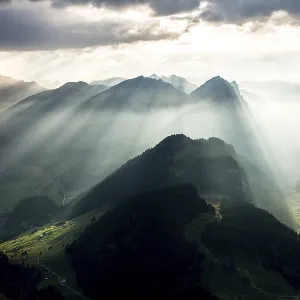 Mountains, Landscape with sun rays in haze on Kanisfluh