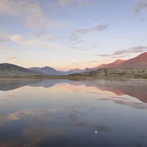 Mountains reflected in Lake Doralstjornin or Doralstjornin