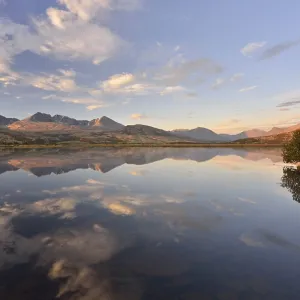 Mountains reflected in Lake Doralstjornin or Doralstjornin