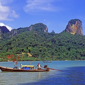 Mountains, sea, longtail boat, two years in front of the tsunami Mountains, sea, longtail boat, two years in front of the tsunami