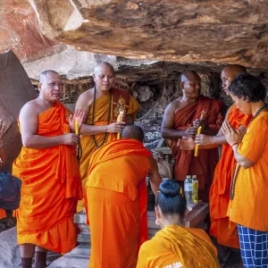 Muang Champassak, Laos - Feb 2016: Group of buddhist prayers at Wat Phou temple