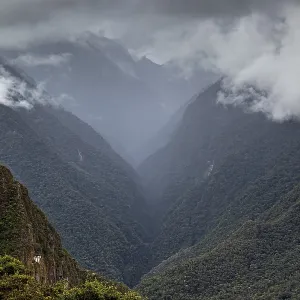Mystical mountain landscape covered by clouds