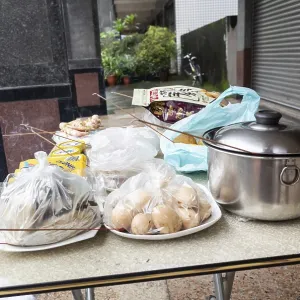 Nantou, Taiwan - August 15th, 2019: Taiwanese people put pork Nantou, Taiwan - August 15th, 2019: Taiwanese people put pork