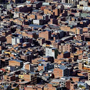 Narrowly built, dense city view with predominant brick buildings