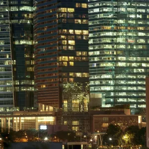 Night skyscrapers illumination in modern Singapore Night skyscrapers illumination in modern Singapore