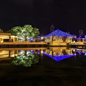 Nocturnal scene with illuminated pavilions Nocturnal scene with illuminated pavilions