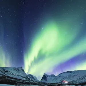 Northern Lights (Aurora borealis) over mountains
