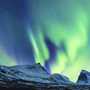 Northern Lights (Aurora borealis) over mountains