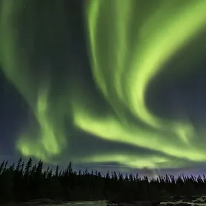 Northern Lights or Aurora Borealis above river Gamajahka or Kamajakka Northern Lights or Aurora Borealis above river Gamajahka or Kamajakka