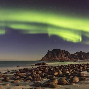 Northern lights (Aurora borealis) in winter Scandinavian landscape Northern lights (Aurora borealis) in winter Scandinavian landscape