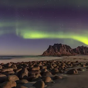 Northern lights (Aurora borealis) in winter Scandinavian landscape Northern lights (Aurora borealis) in winter Scandinavian landscape