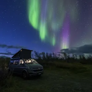 Northern lights over camper, VW California Northern lights over camper, VW California