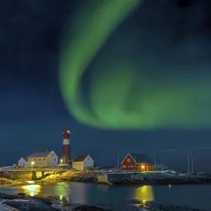 Northern lights Hamaroy lighthouse in Norway Northern lights Hamaroy lighthouse in Norway