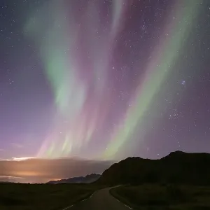 Northern Lights over mountain landscape (Aurora borealis) Northern Lights over mountain landscape (Aurora borealis)