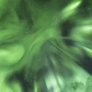 Northern lights in front of a starry sky