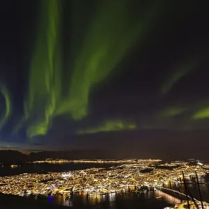 Northern Lights over Tromso, view from mountain Storsteinen Northern Lights over Tromso, view from mountain Storsteinen