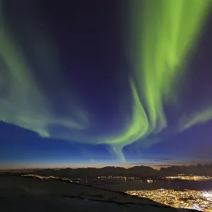 Northern Lights over Tromso, view from mountain Storsteinen Northern Lights over Tromso, view from mountain Storsteinen