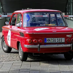 NSU TTS, red classic car on cobblestone road during a car race