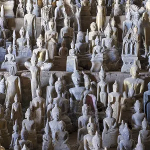 Numerous Buddha statues in Pak Ou Cave Numerous Buddha statues in Pak Ou Cave