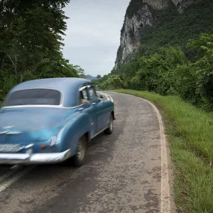 Old american car drive in Cuba rural village