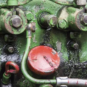 Detail of an old historic tractor old-timer motor Detail of an old historic tractor old-timer motor