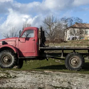 Old rusty soviet vintage heavy big truck closeup Old rusty soviet vintage heavy big truck closeup