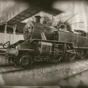 Old steam train, vintage locomotive on train station Old steam train, vintage locomotive on train station