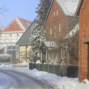 Old three-sided courtyard and half-timbered houses
