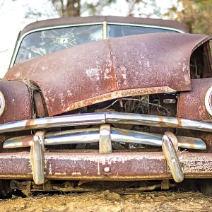 Old timer abandoned automobile on the farm Old timer abandoned automobile on the farm